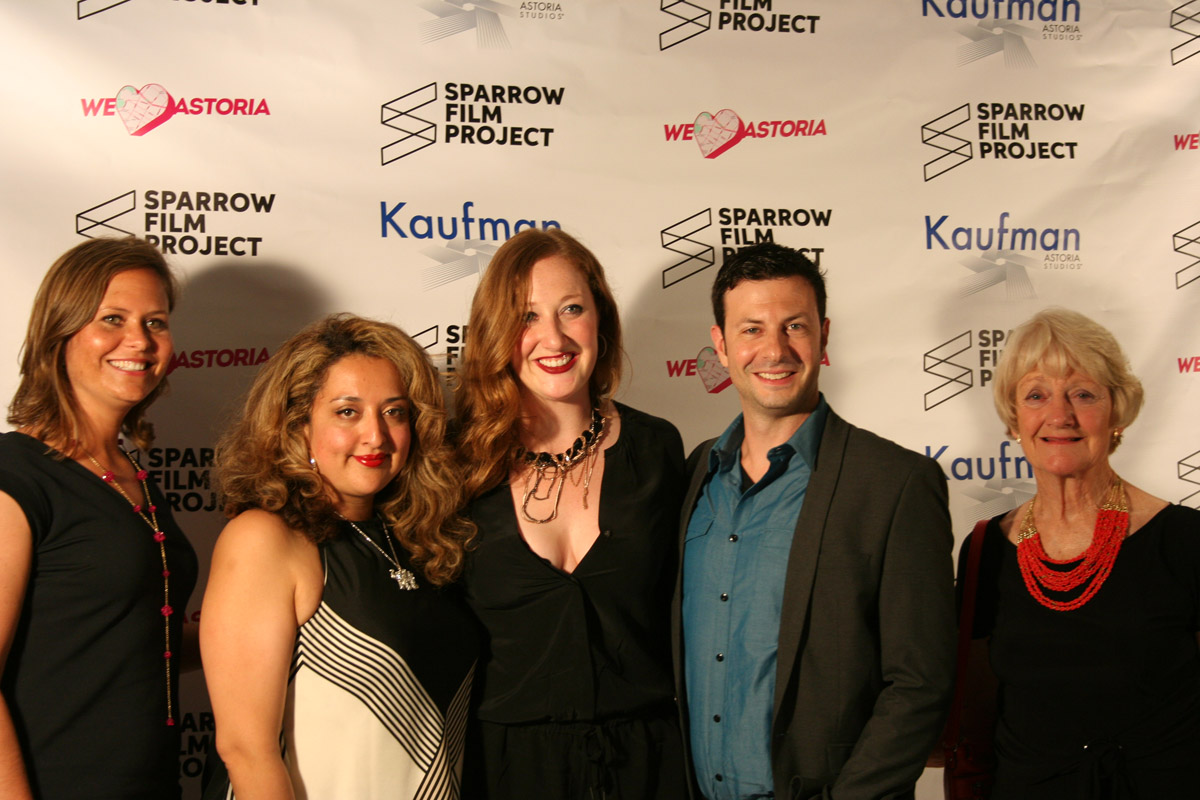 Sparrow Film Project 12 Gala: Filmmakers taking pictures during intermission.