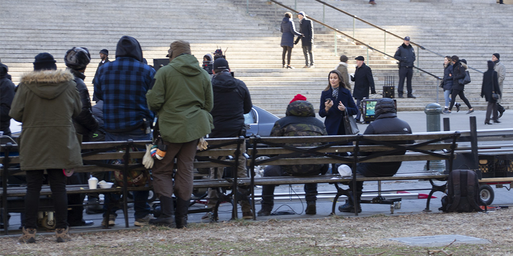 Bridget Moynahan, on set of Blue Bloods, along with crew.