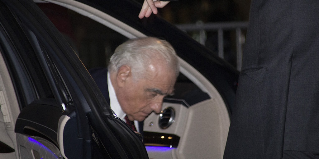 Martin Scorsese exiting his ride about to enter the press tent.