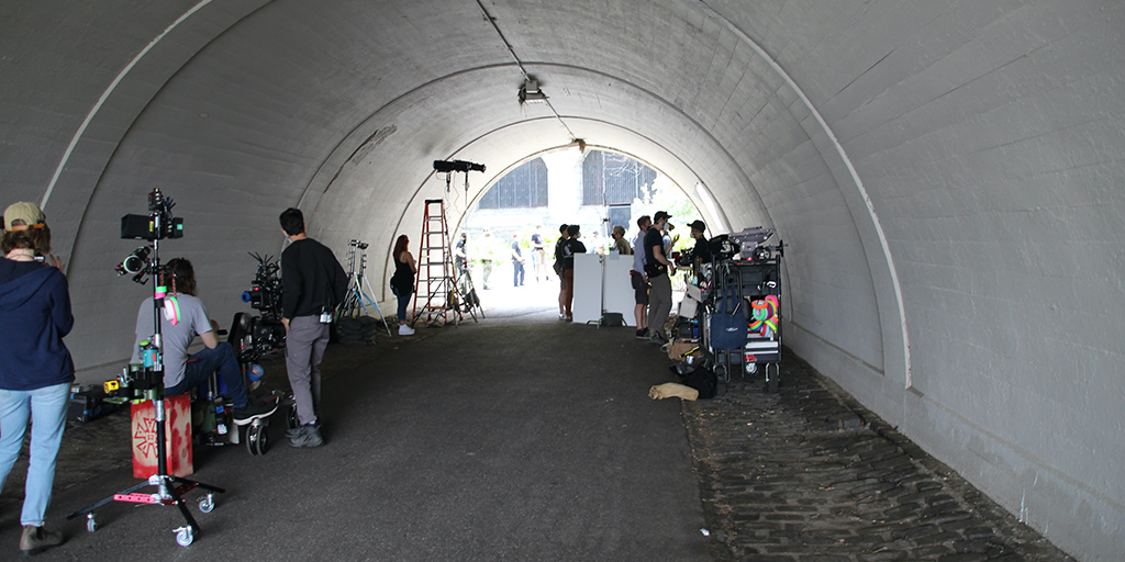 Crew set up inside a tunnel for shooting in Riverside Park.