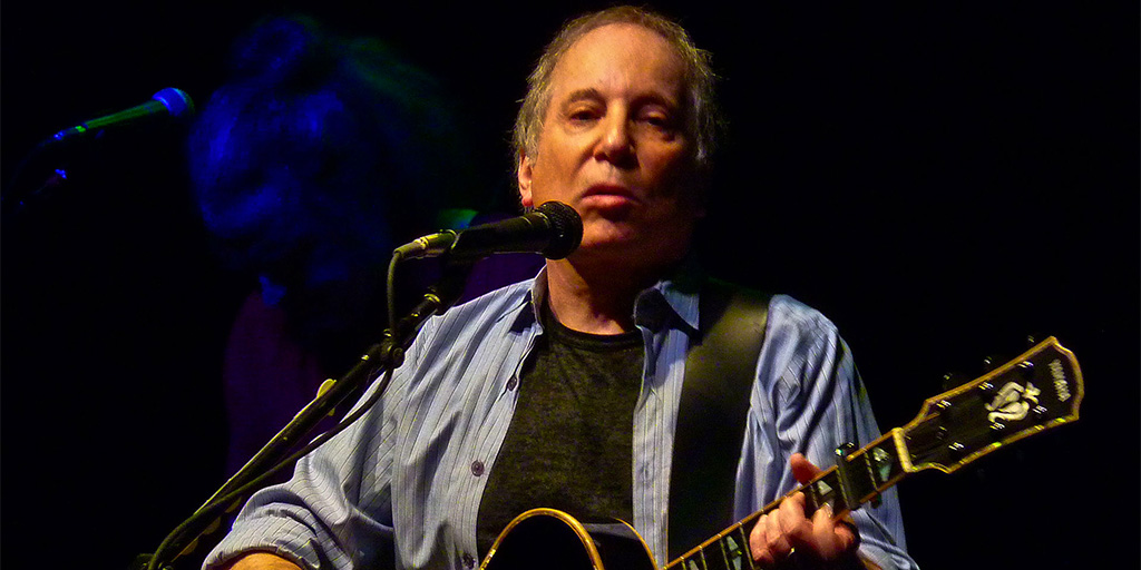 Paul Simon performing at the 9:30 Club in 2011 - Matthew Straubmuller