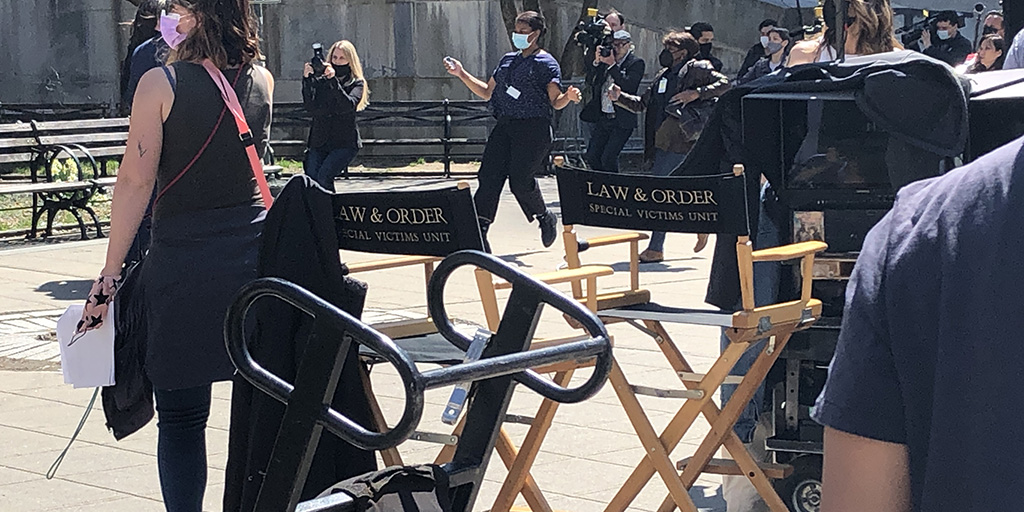 Crew and actors filming Law & Order Special Victims Unit in front of the New York County Supreme Court building.