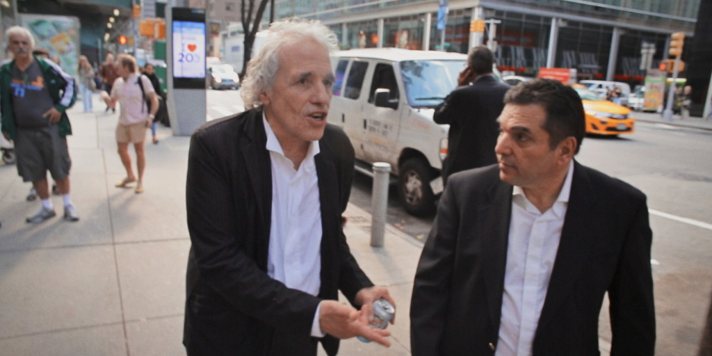 Screen capture from The Projectionist. Abel Ferrara (left) and Nicolas Nicolaou